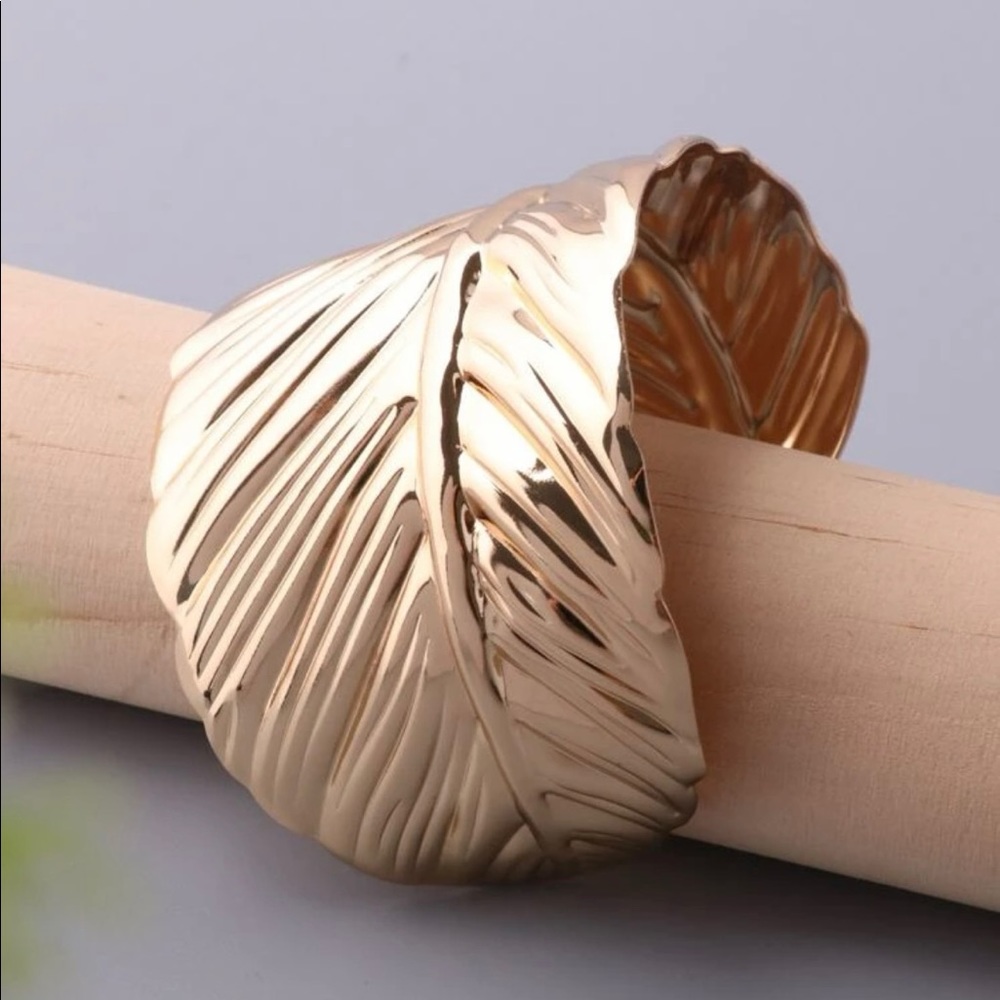 Beautiful gold bohemian feather bracelet cuff